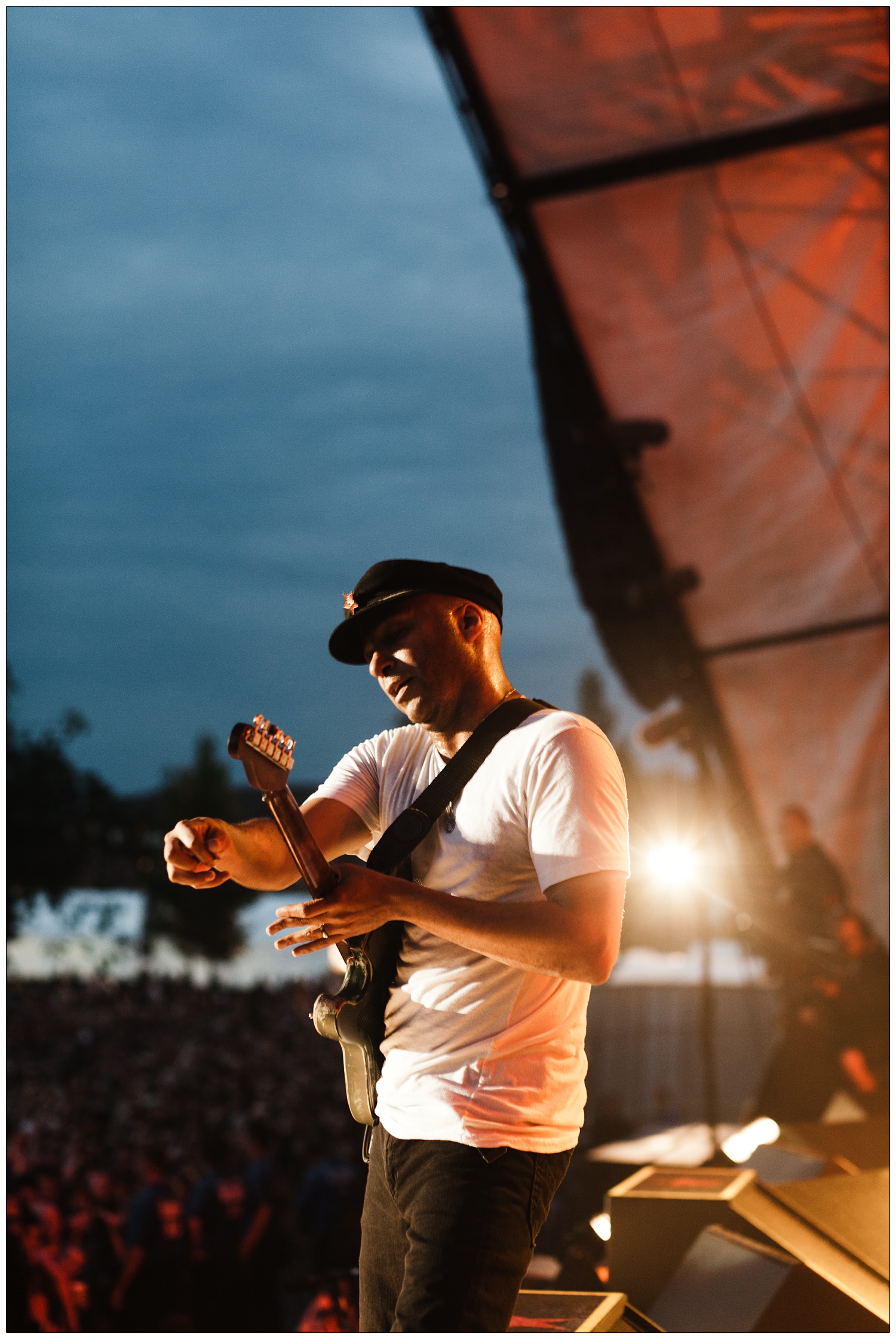 A view of the sky, the crowd and lights, as Tom Morello plays at the Rage Against The Machine gig in Finsbury Park