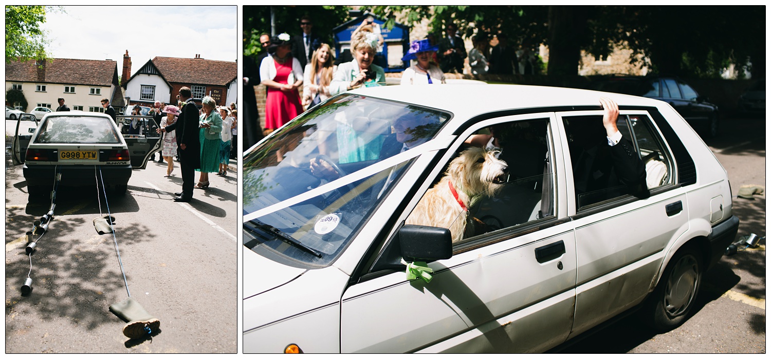 A dog in a car after a wedding. Wellington boots are tied to the back.