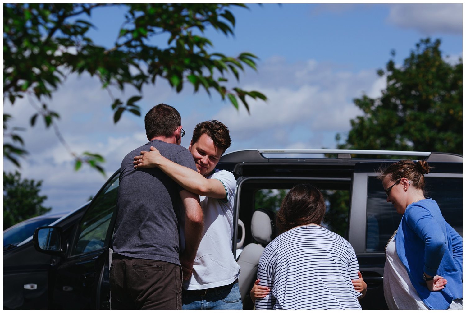 Man hugging a friend.