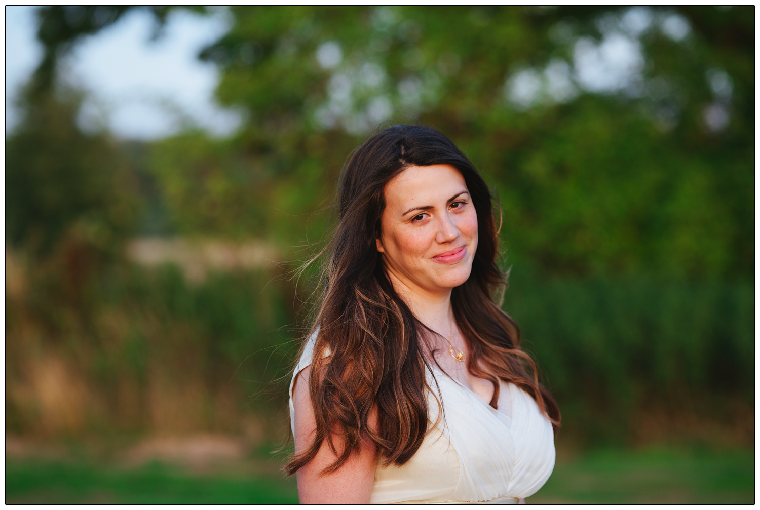 Bride looking at the camera in golden light.