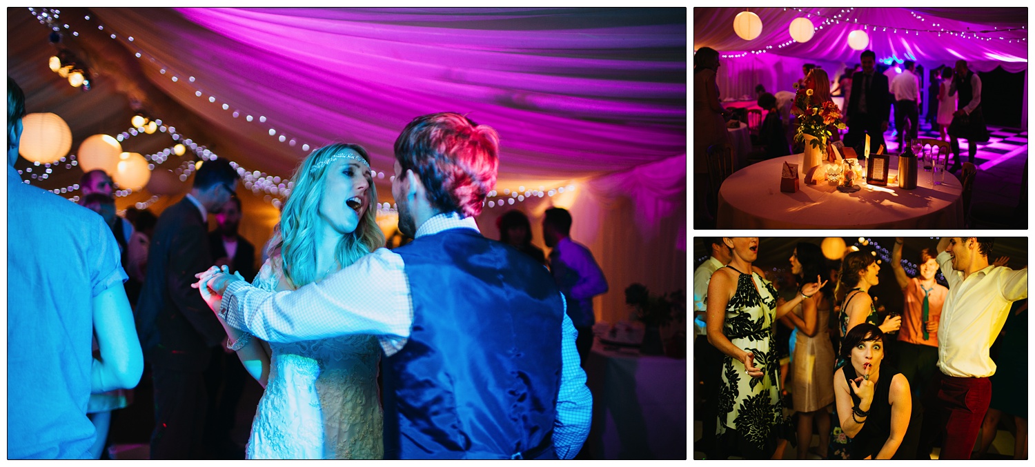 A bride sings while dancing with her new husband. They are in a marquee at the Inn at Whitewell, the lighting is cyan and magenta.