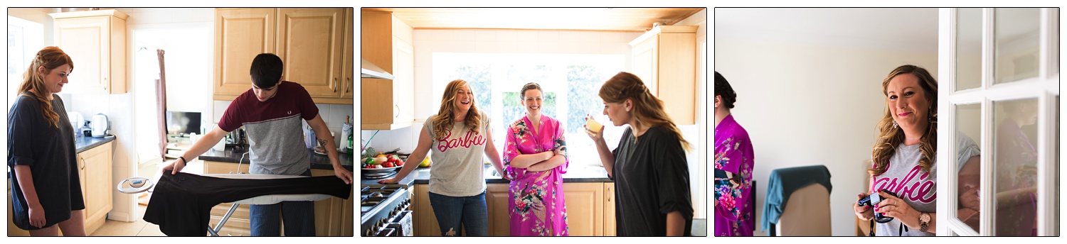 Bride in a dressing gown in a kitchen with her friend and sister.