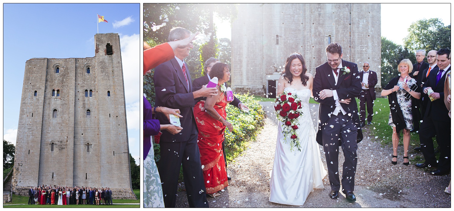 People throwing confetti and bride and groom at Hedingham castle.