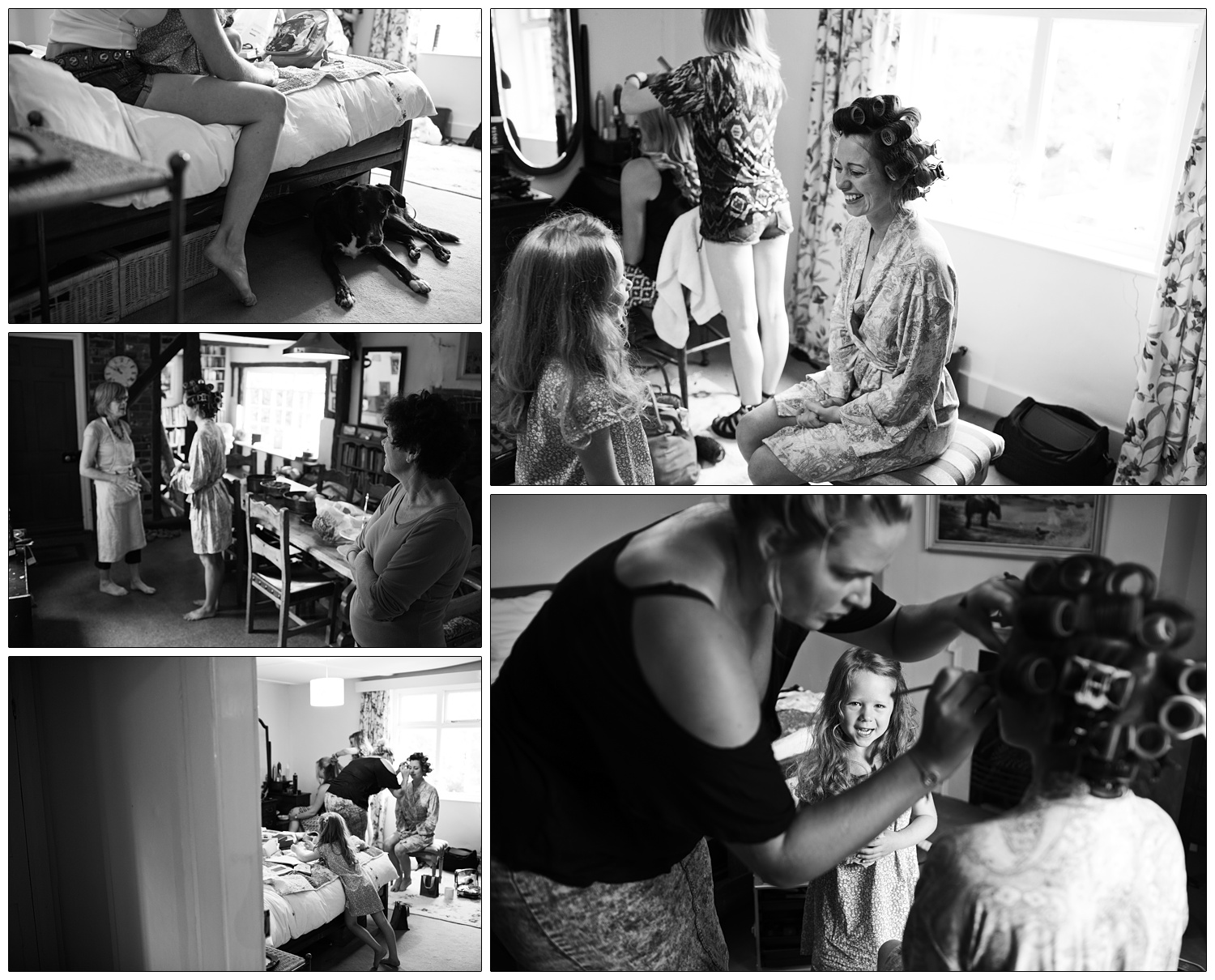 Candid reportage style pictures of wedding preparation at home in Essex. A little girl smiles up at the bride in rollers. A dog is under the bed.