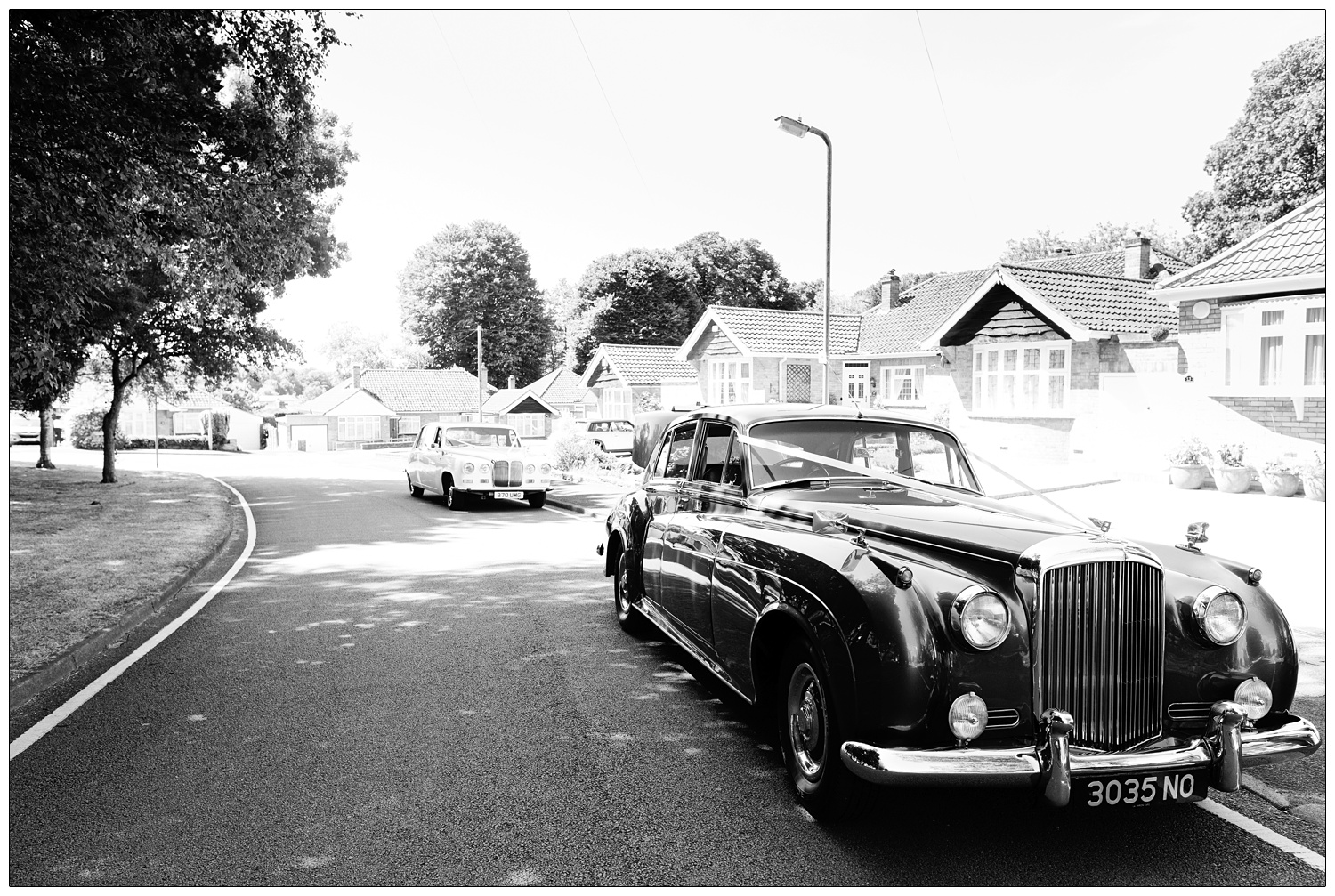 A Bentley dressed for a wedding.