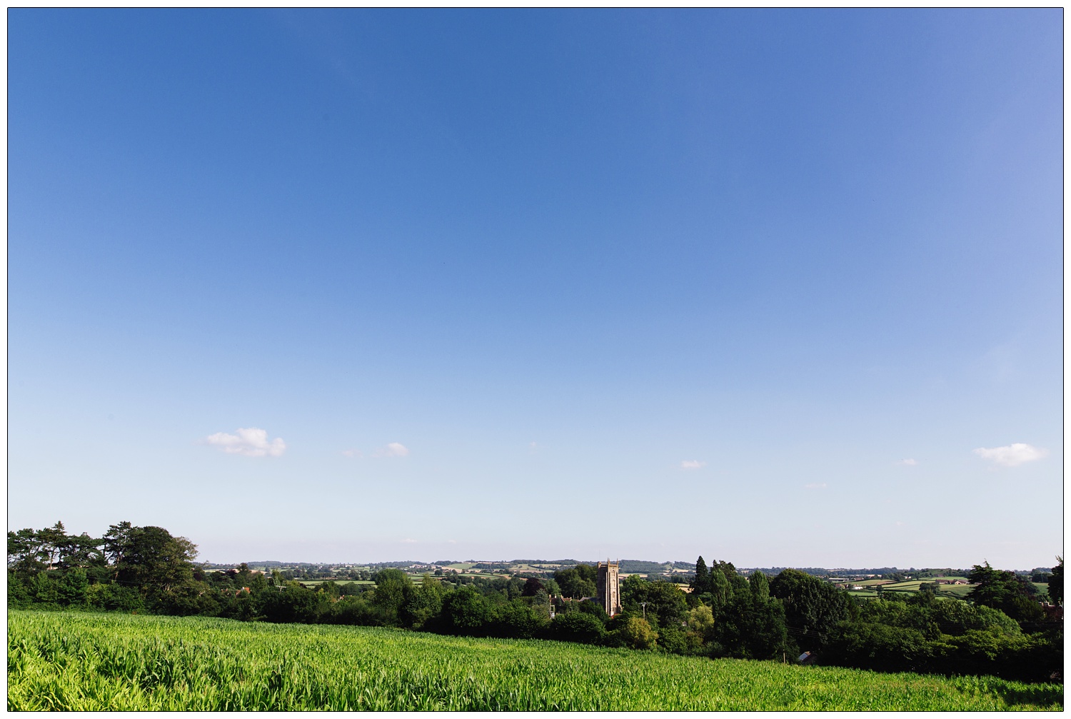 The view of St Andrew's Church, Chew Magna and the countryside from the bride's family home. Where the wedding reception is taking place.