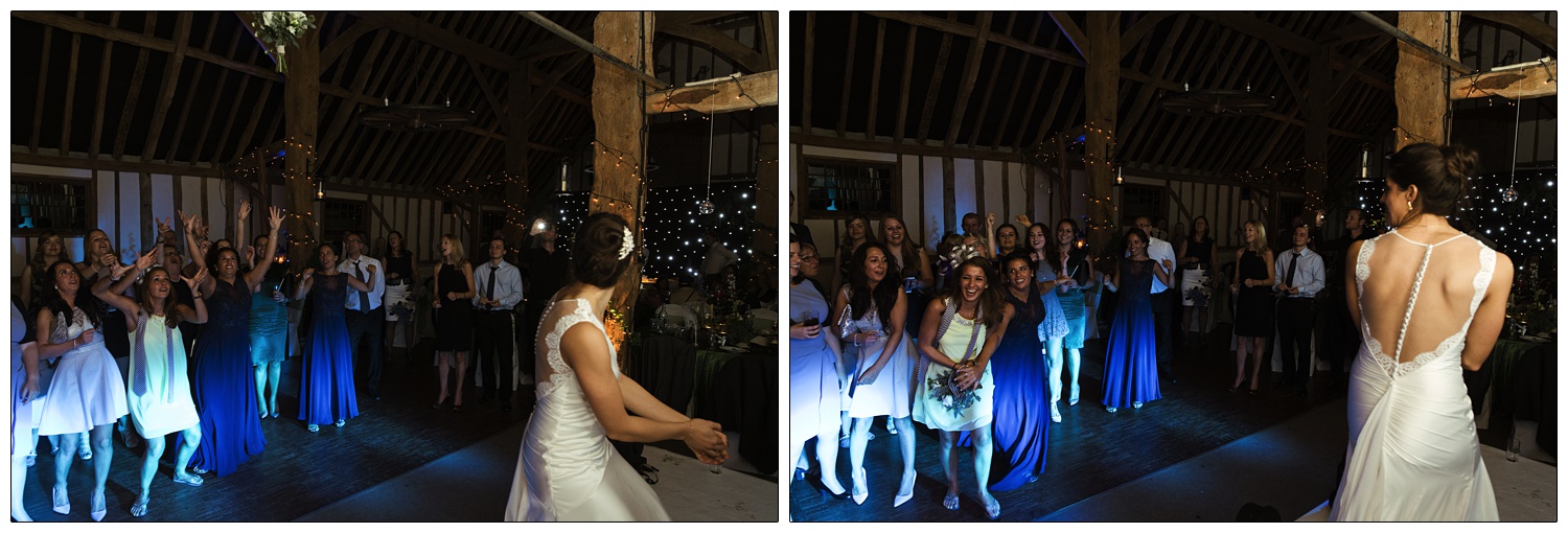 A woman ina wedding dress throwing the bouquet.