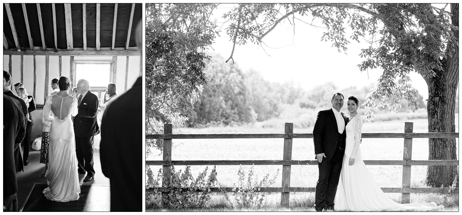 bride and groom standing by a tree