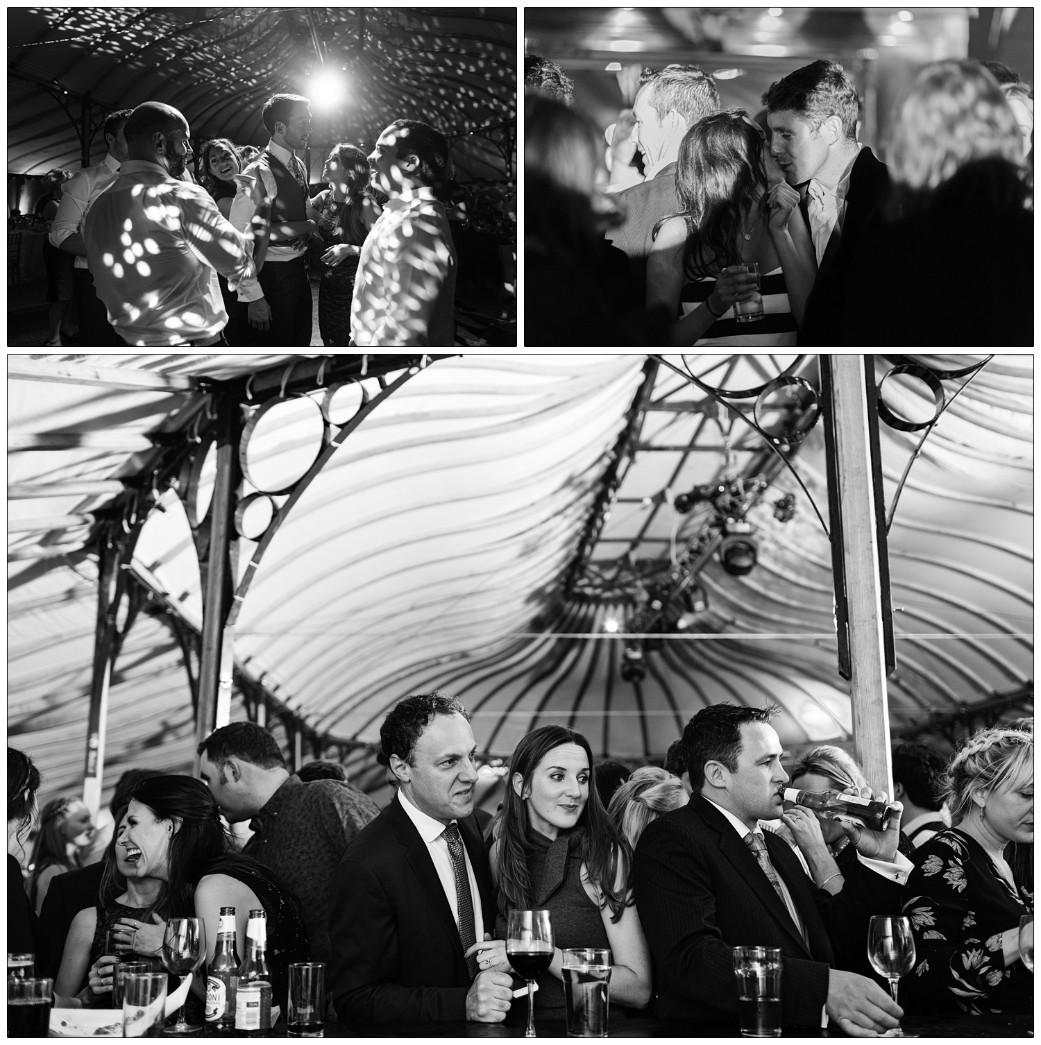 People wait at the bar at a wedding reception. A man is drinking a beer. They are in an orangery tent.