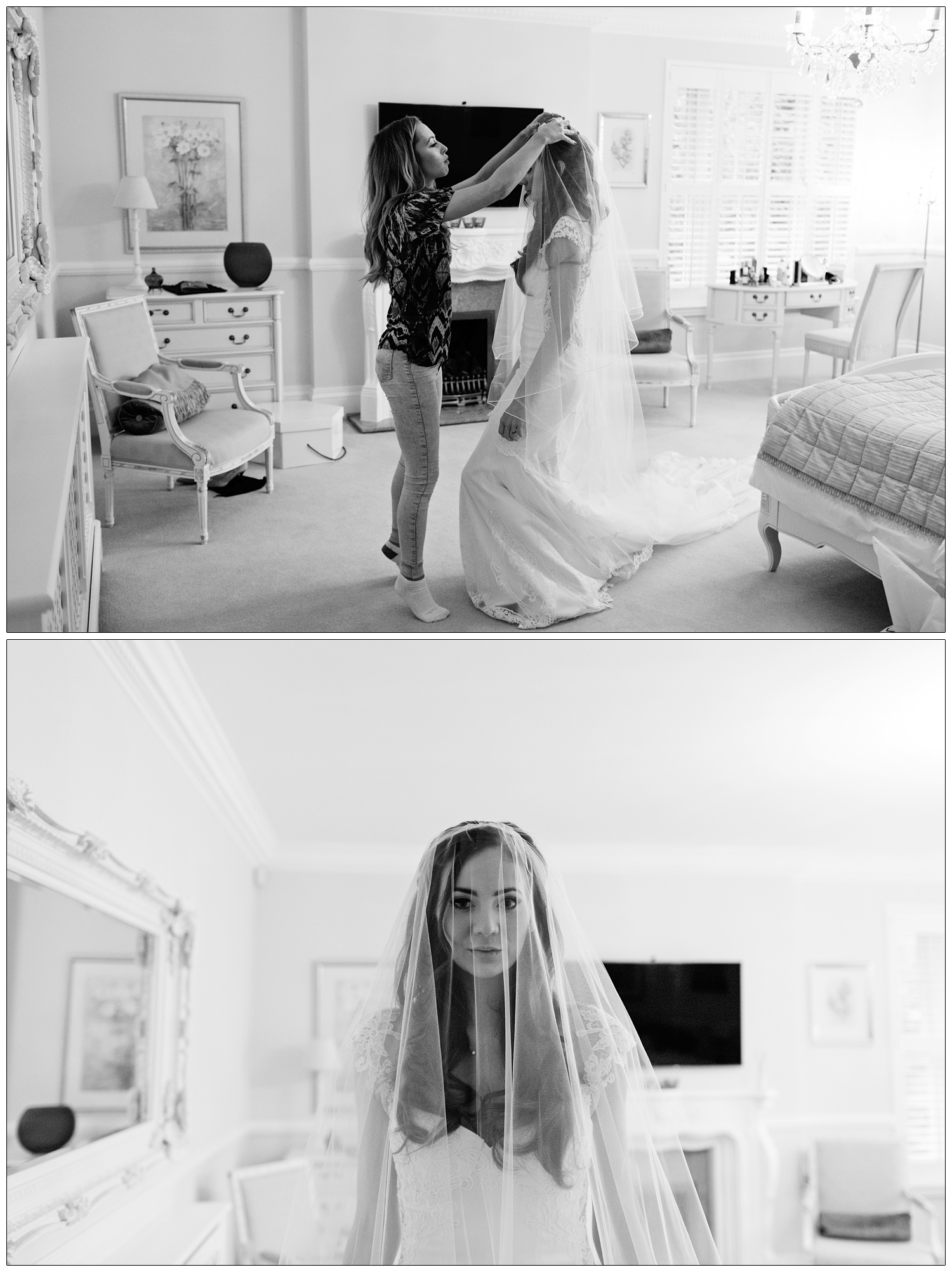 A hairdresser puts the veil on a bride in a bedroom. The bride, wearing Galia Lahav from Browns in London, looks at the camera through her veil.
