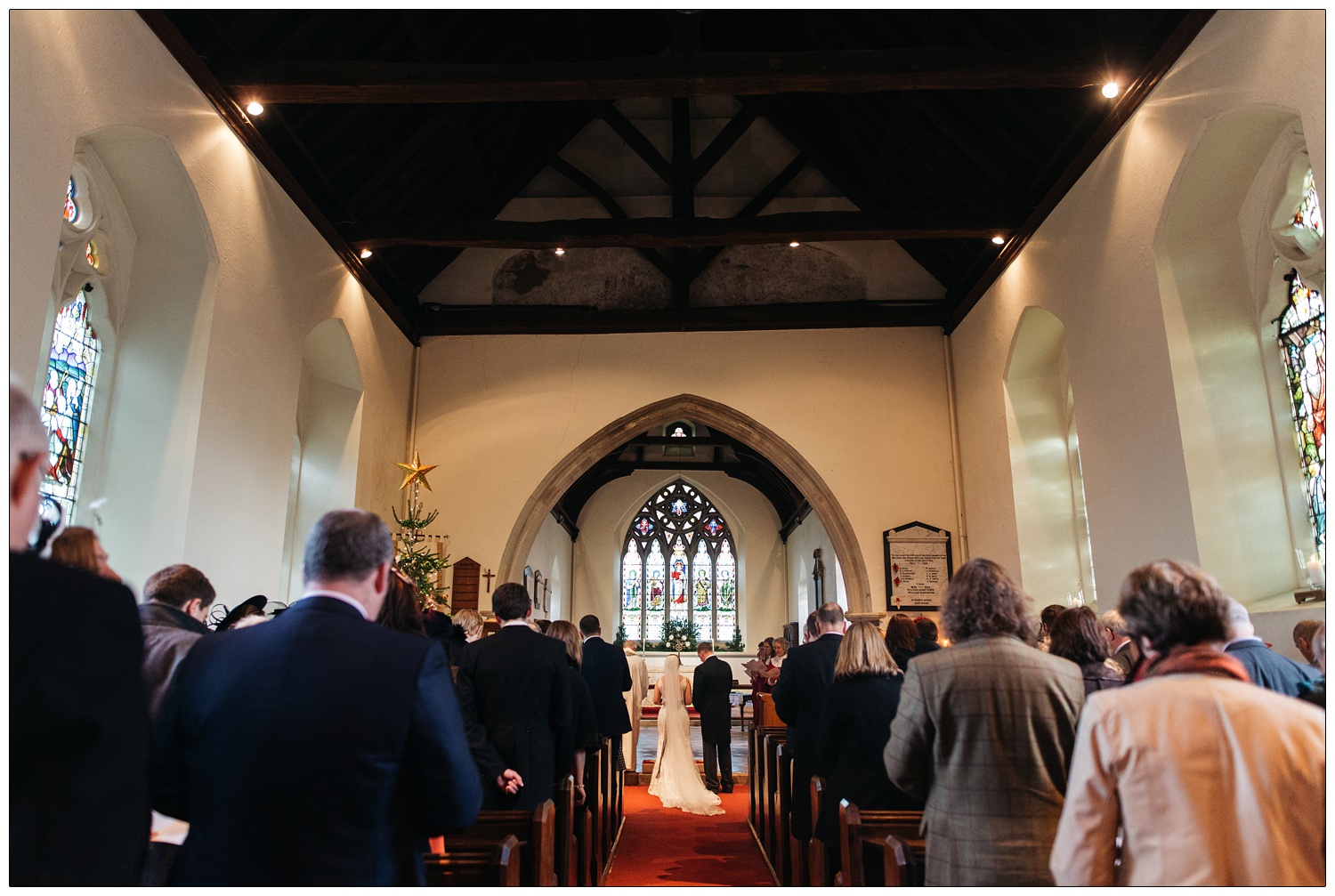 A wedding ceremony in progress in Bradwell-on-Sea.