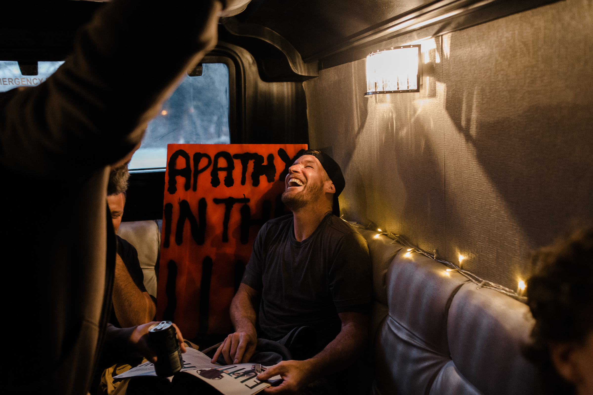 Tim Commerford laughing on a bus on music video shoot for WAKRAT song Generation Fucked