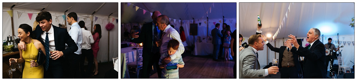 Little boy playing his Nintendo DS at a wedding reception.
