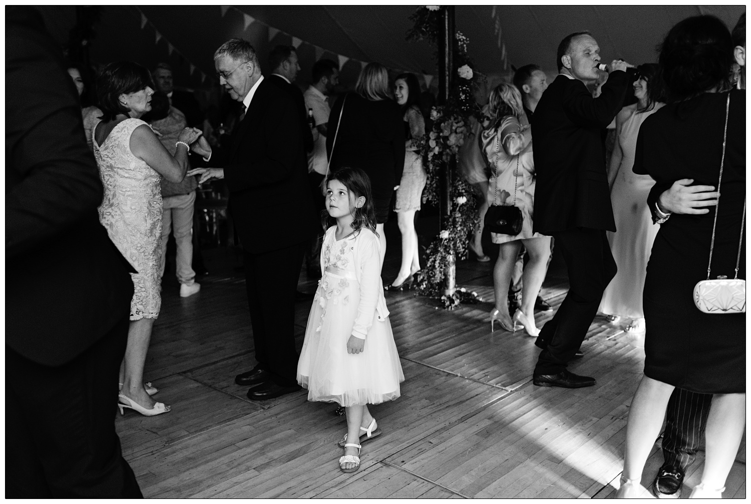 flower girls on the dance floor at a wedding