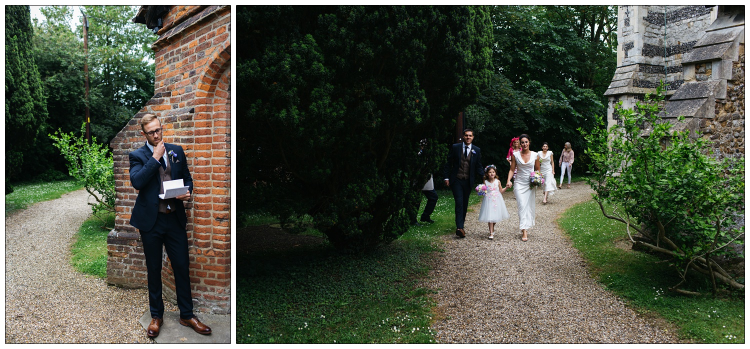 Bridesmaids and guests walking up the gravel church path.