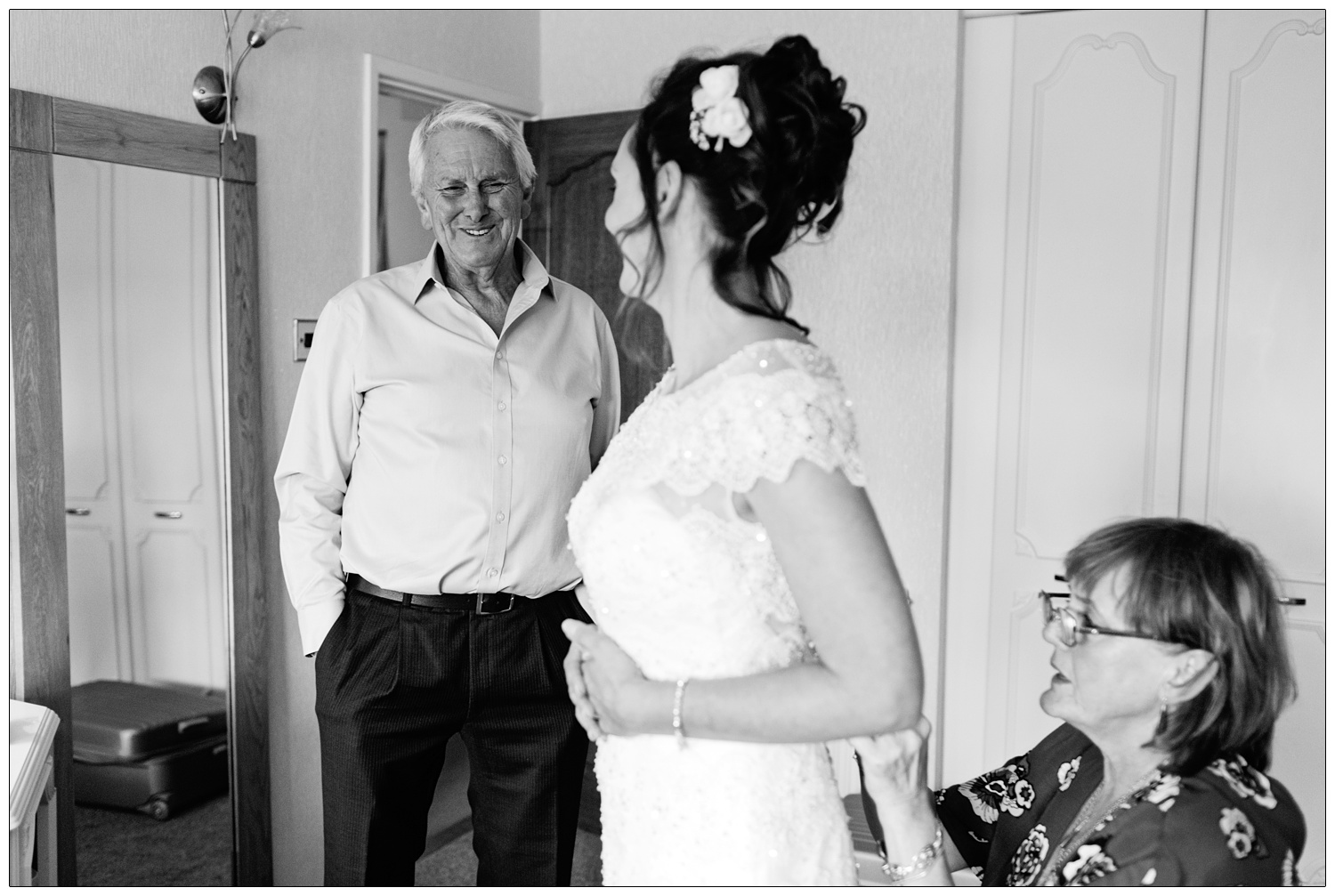 father seeing his daughter in her wedding dress