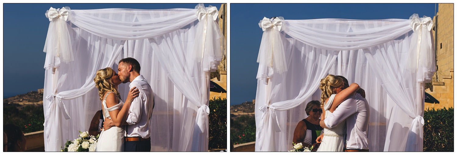 bride and groom kissing once married