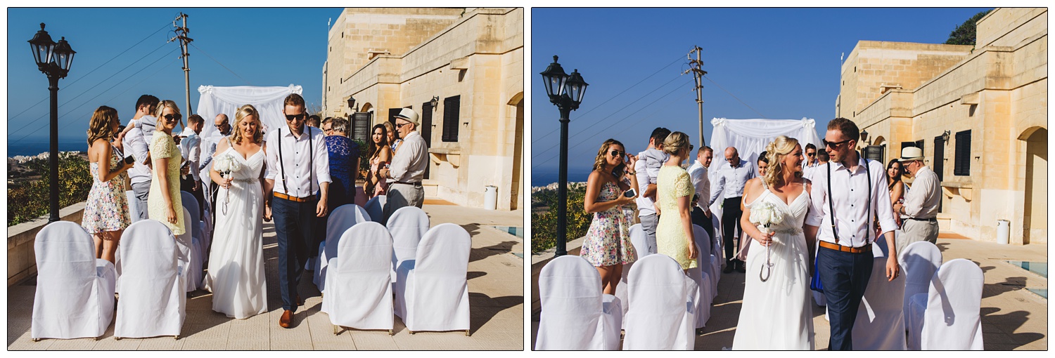 bride and groom walking down the aisle after wedding at The Cornucopia Hotel, the sky is very blue and the groom and many guests wear sunglasses