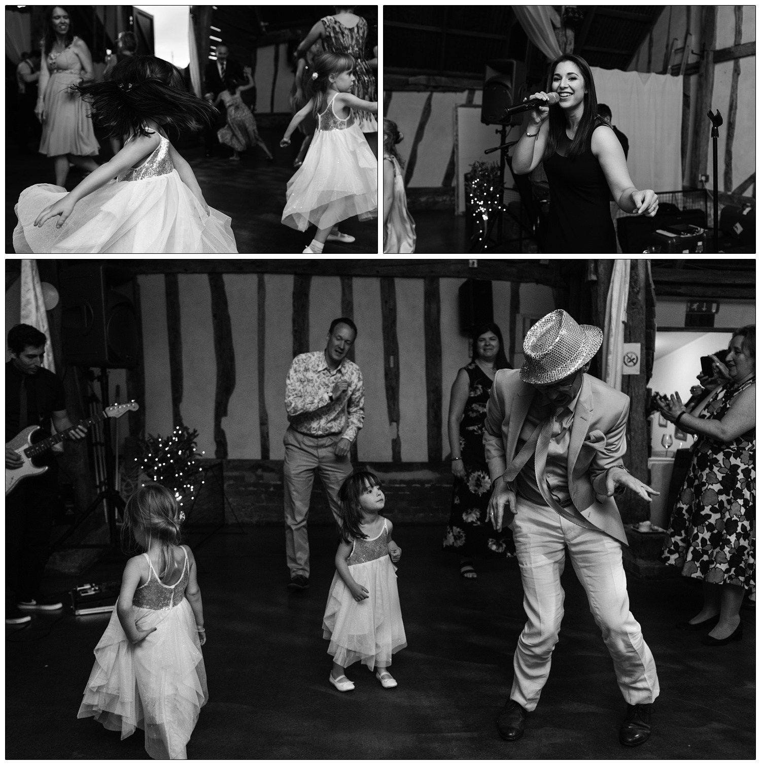 A small girl is watching a man in a sparkly hat dancing at a wedding reception.