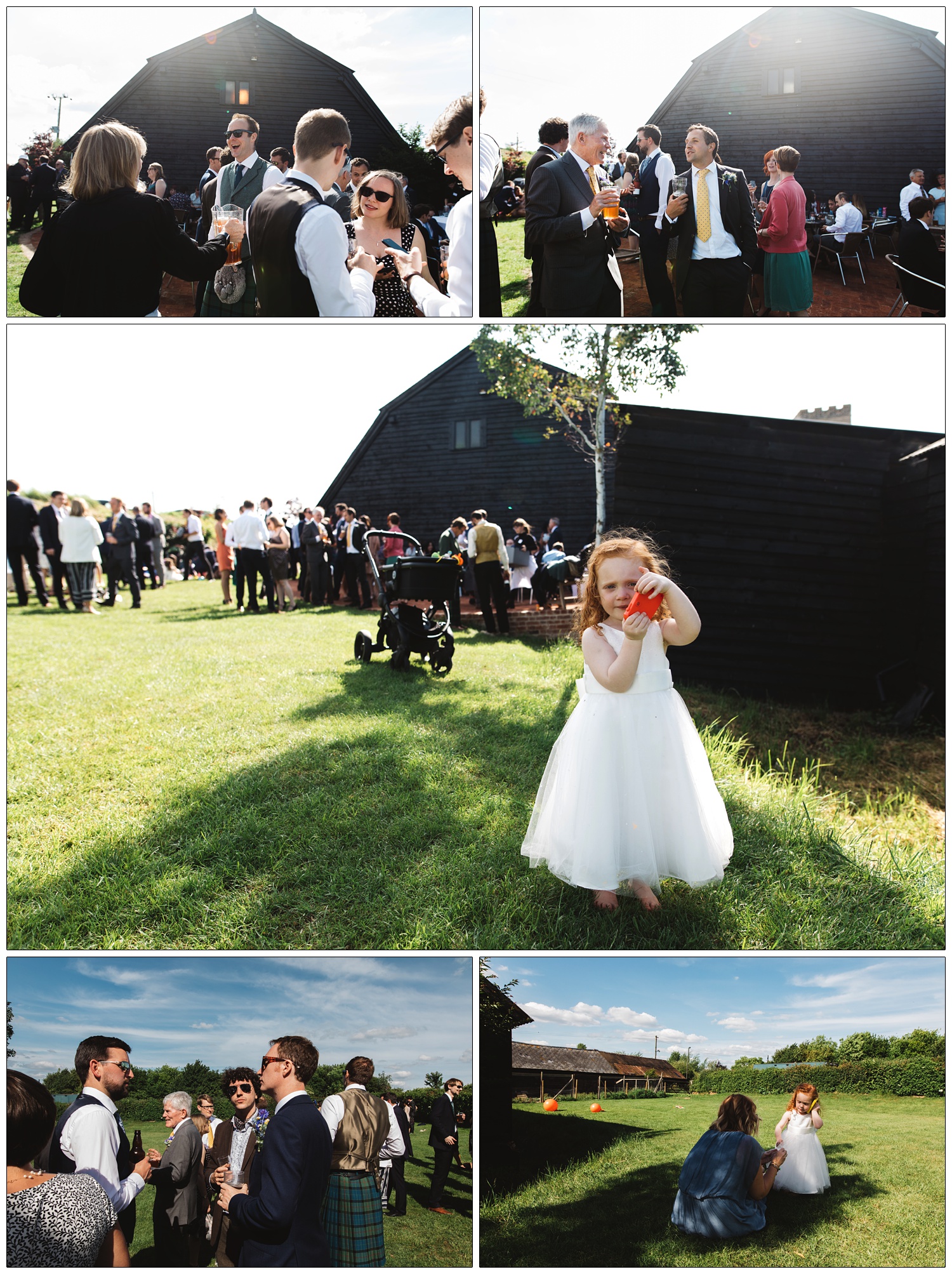 Small girl in a white dress with red hair takes a picture of the photographer.