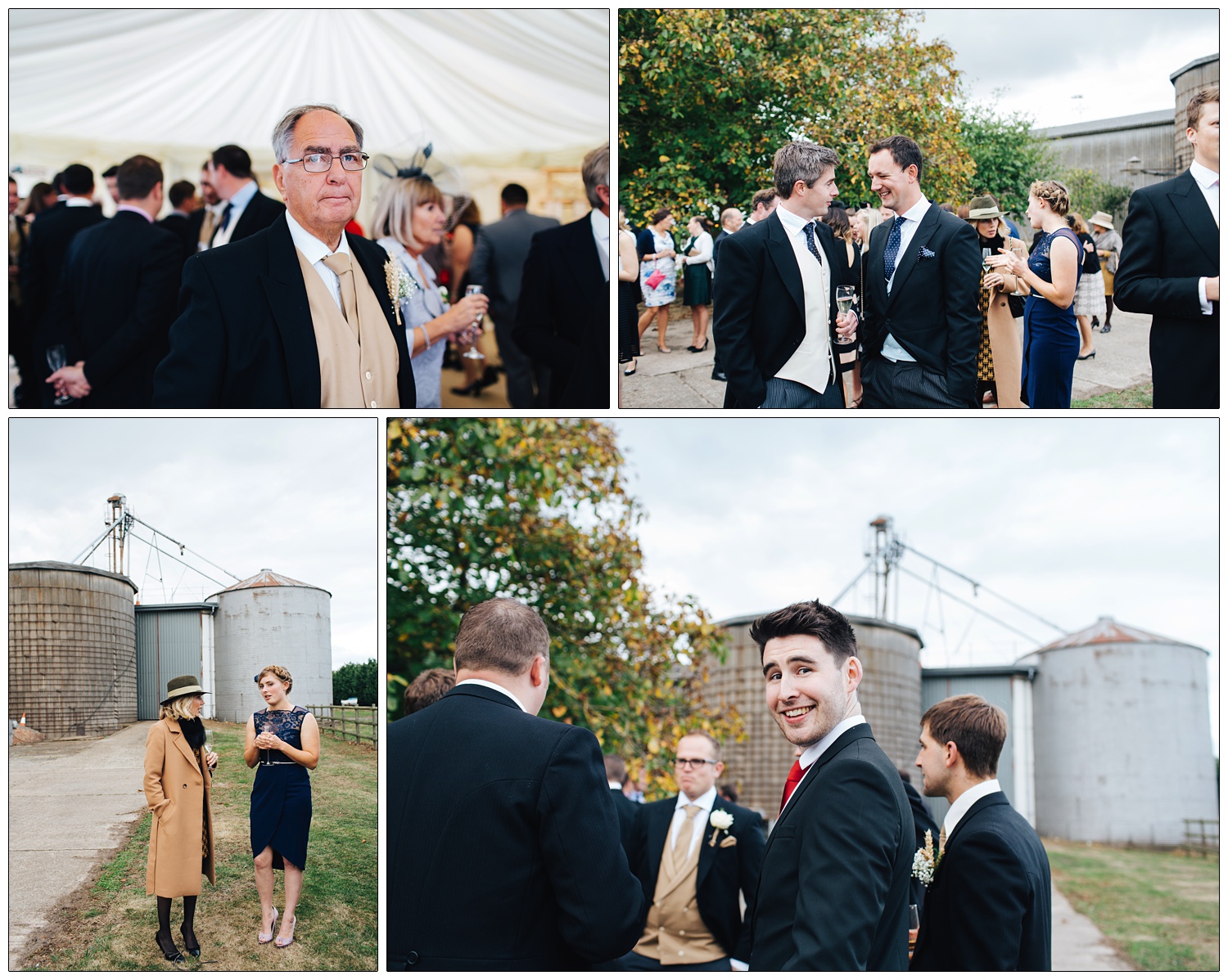 wedding guests chatting outside, the reception is held on a farm and there are silos and trees in the background
