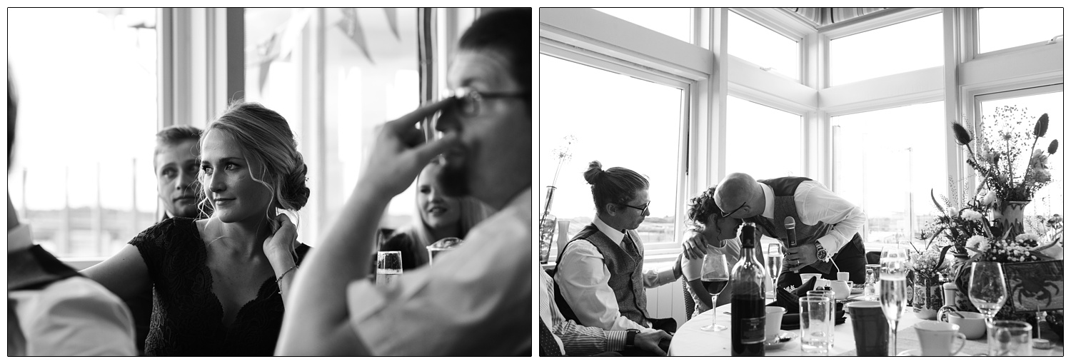 A bridesmaid sat at a table with other guests