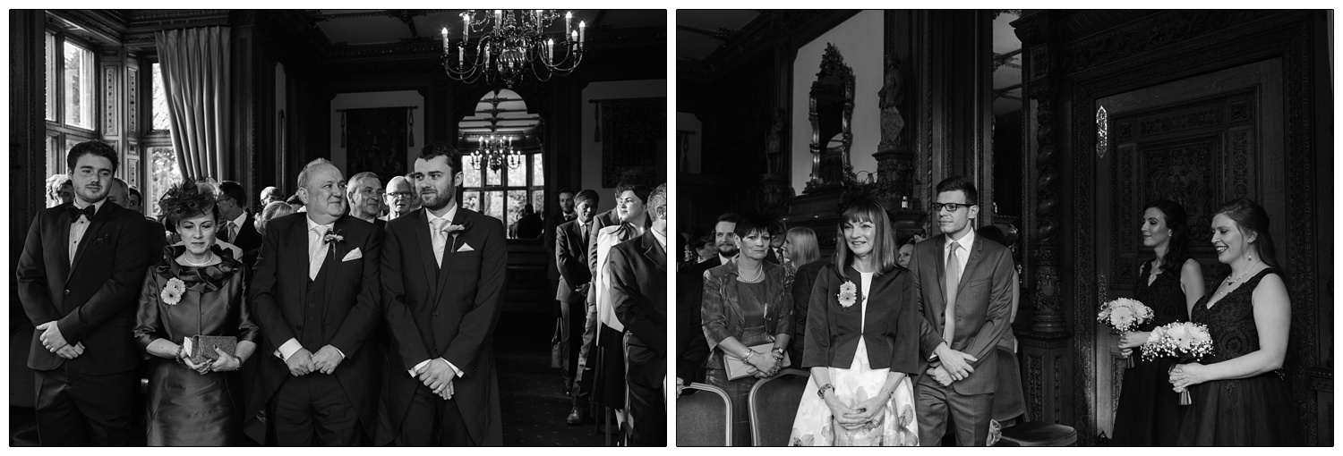 The groom is stood with his family waiting for the bride.