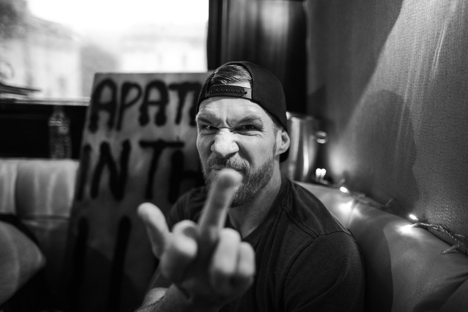 Tim Commerford giving the finger on a bus