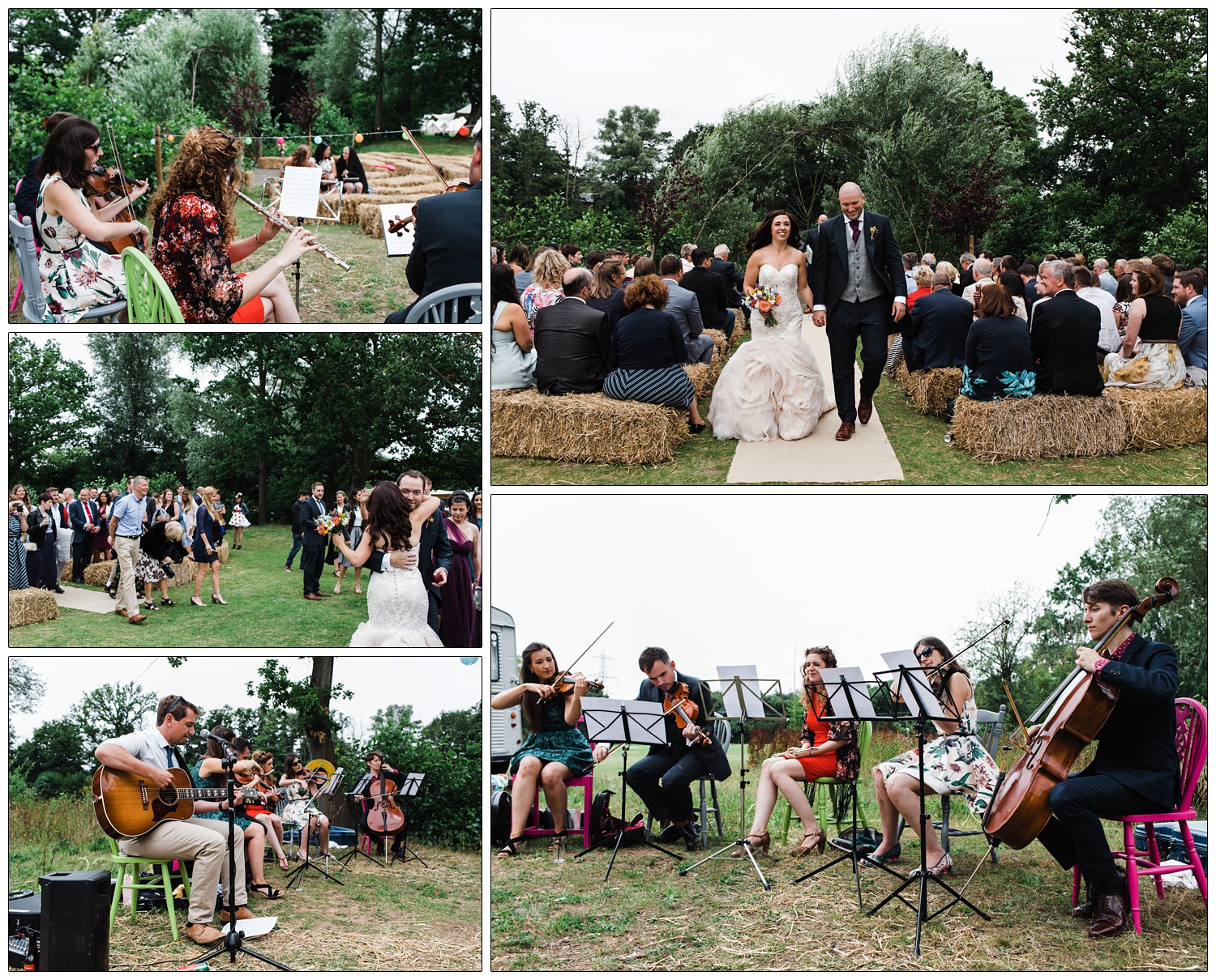 Musicians playing as the bride and groom walk down the aisle in between hay bales.