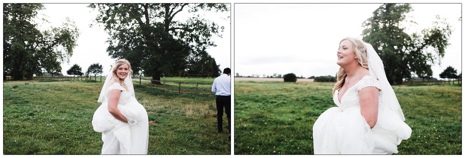 The bride is in a field at the Great Lodge Great Bardfield