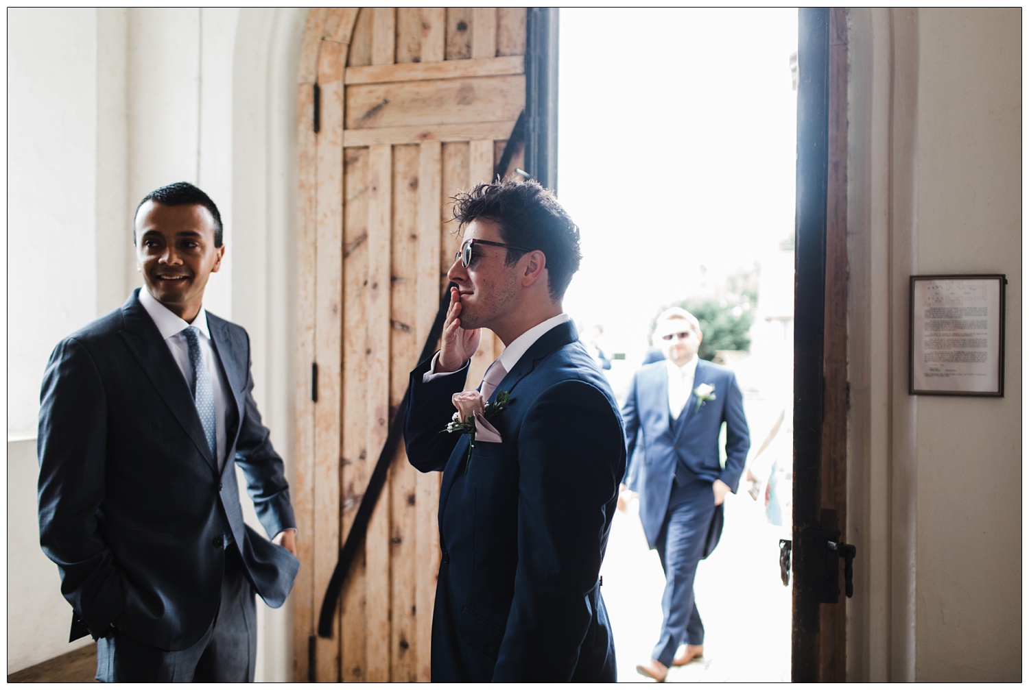 Groom in the St Barnabas church vestibule.