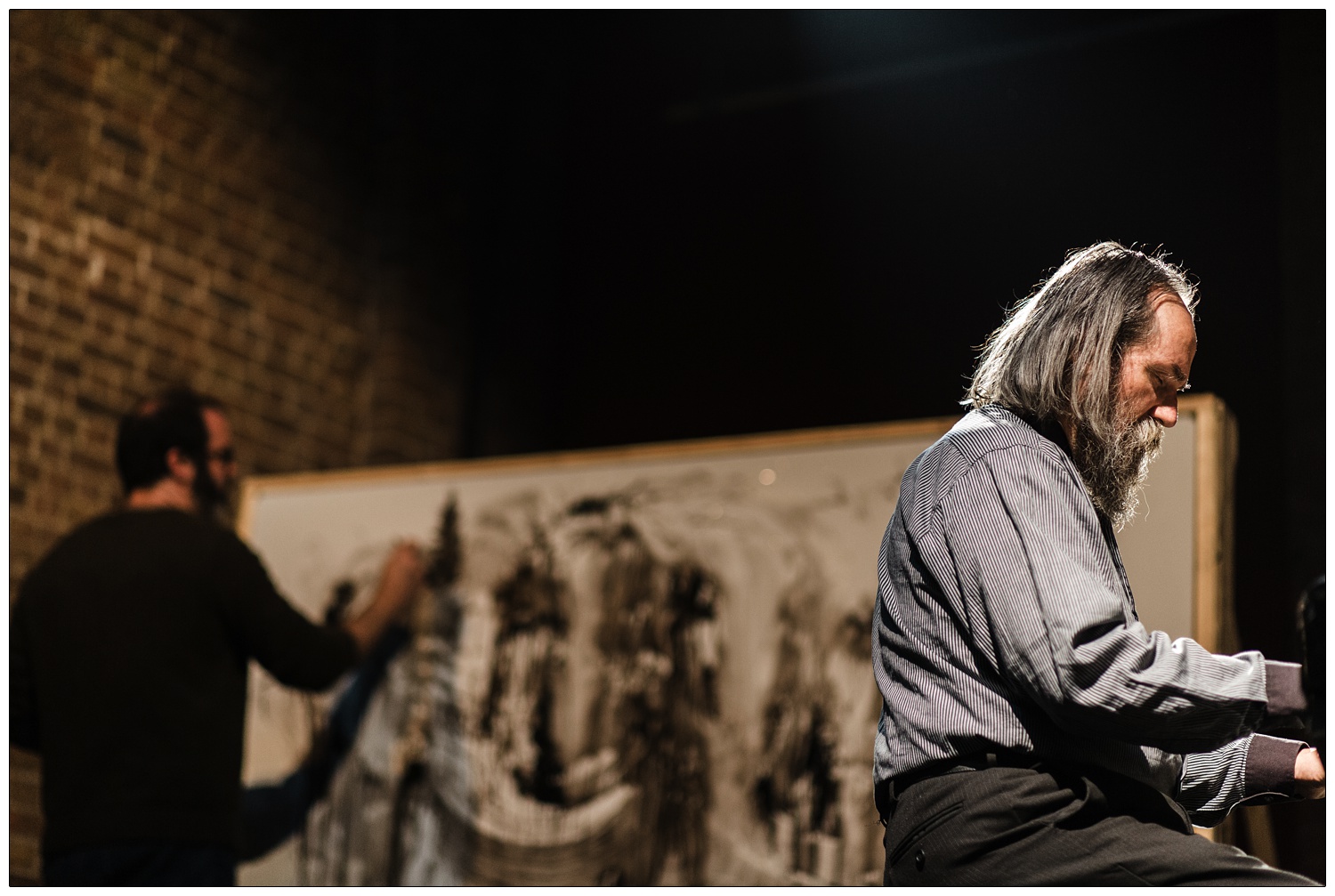 Lubomyr Melnyk playing continuous music on the piano while Gregory Euclide paints at the Village Underground in London