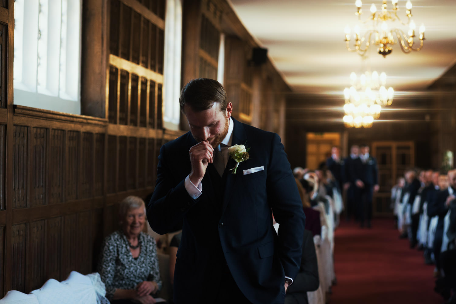 Groom waiting for bride at Gosfield Hall ceremony.