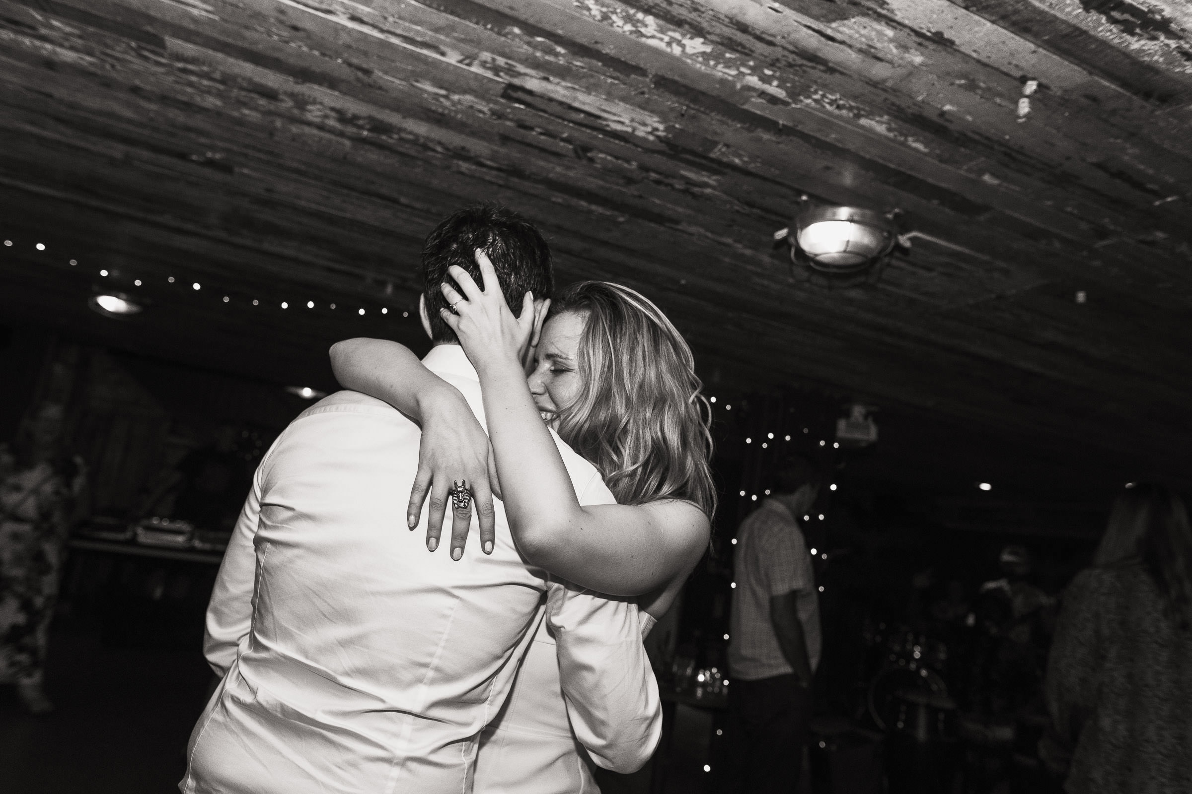 Newly married couple dancing in the basement of Never For Ever restaurant in Kentish town. A London wedding reception.