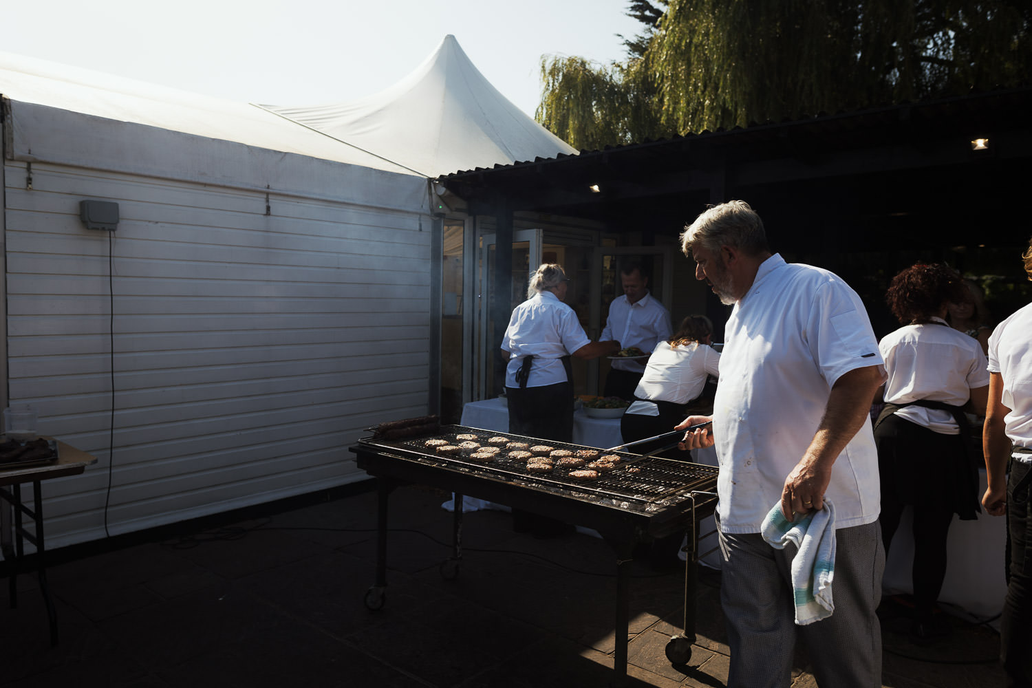 Tony Valentine of Valentine Cuisine South Woodham Ferrers manning the barbecue at High House.