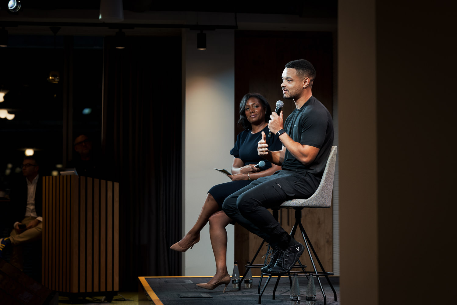 Steven Bartlett on stage during a workplace corporate talk.