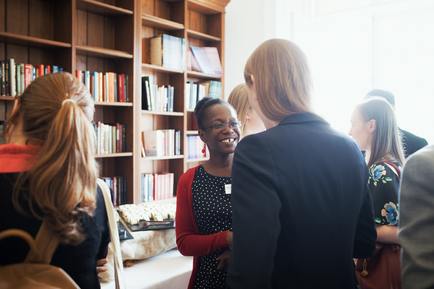 Conference attendees chatting during a break.