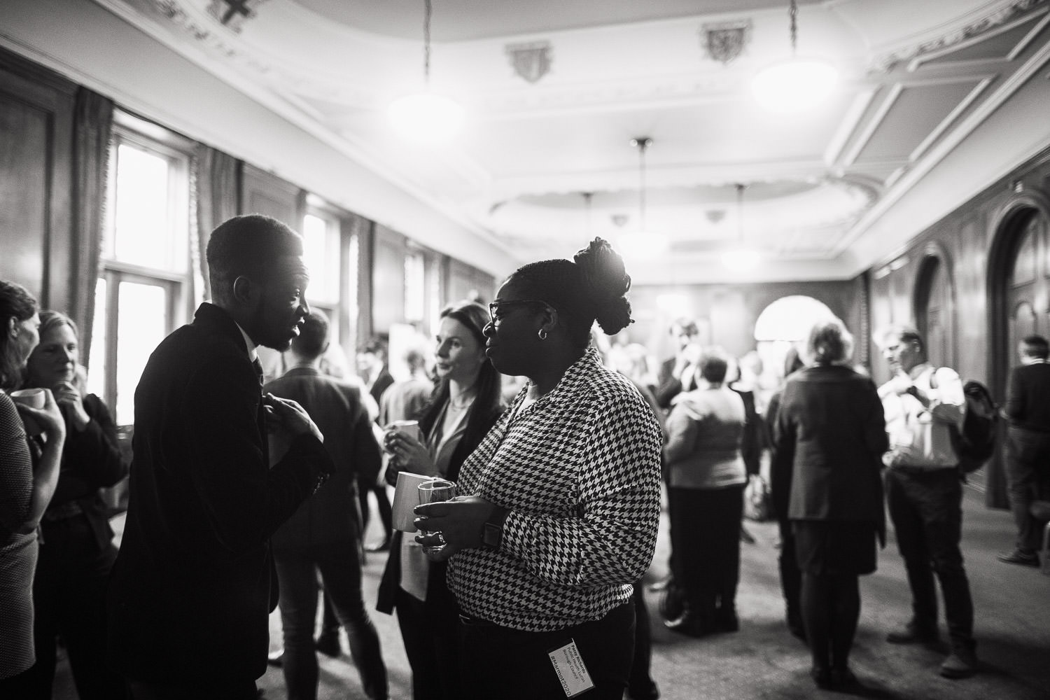 Conference attendees during a break at the Marmot Review 10 Years On,  Church House, Deans Yard, Westminster, London SW1P 3NZ