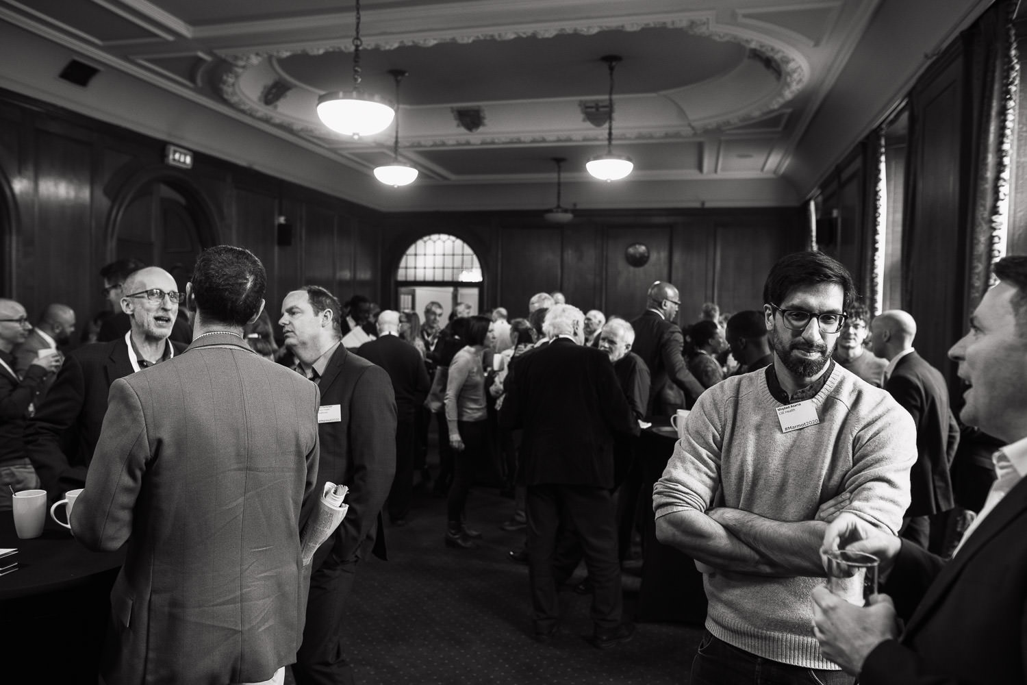 During the coffee break conference attendees mingle.