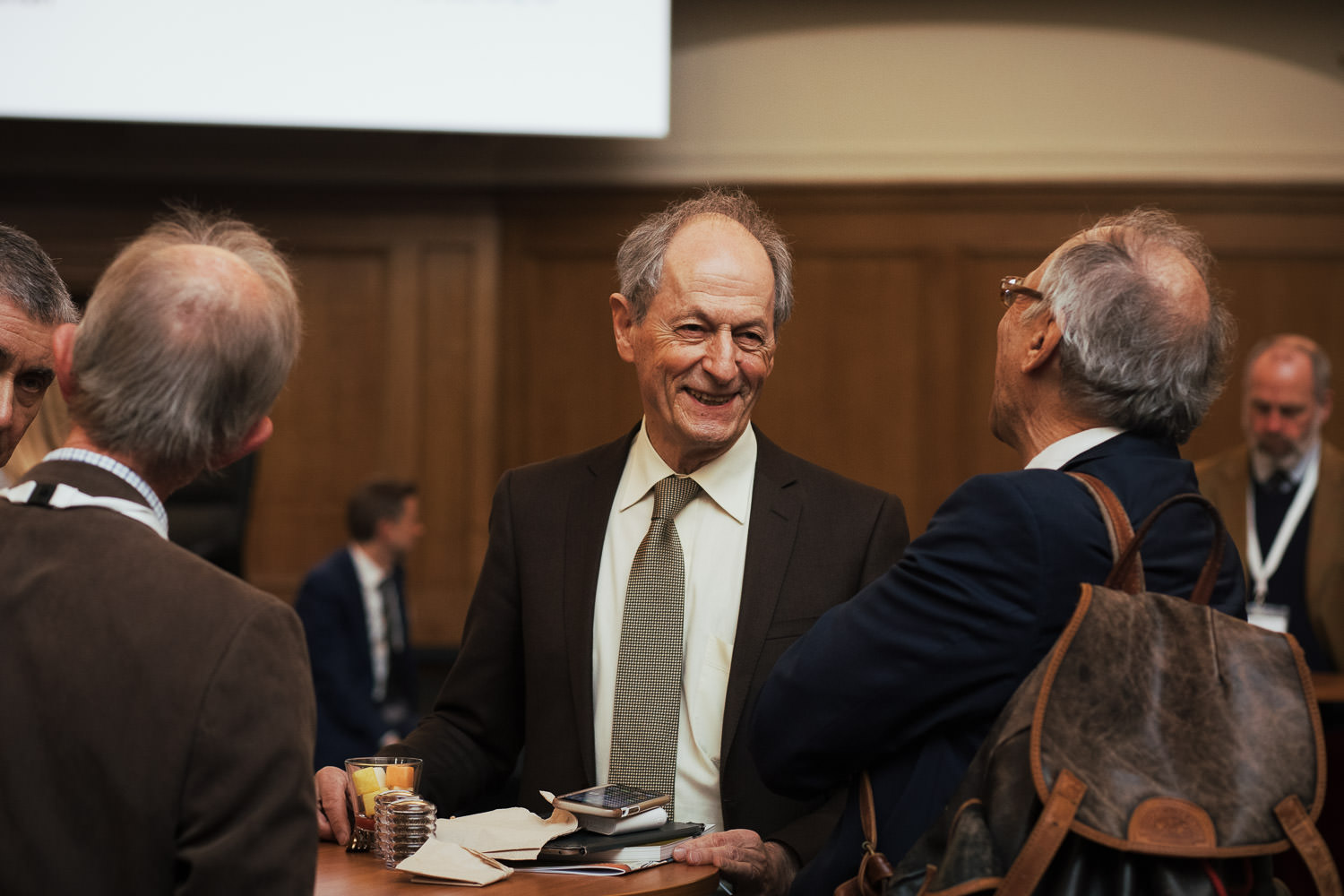 Professor Sir Michael Marmot at the Marmot Review 10 Years On, Institute of Health Equity. Talking to attendees during the break. Church House, Deans Yard, Westminster, London SW1P 3NZ