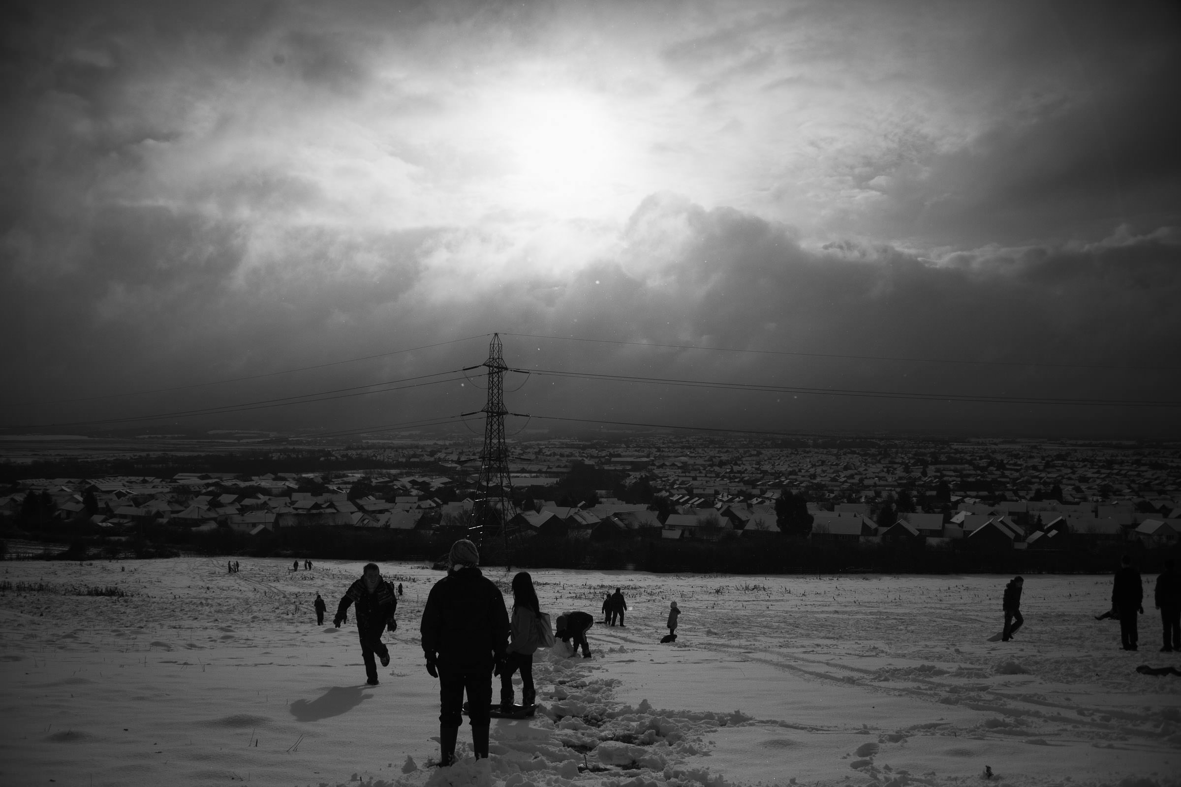 People playing in the snow on Radar Hill/Bushy Hill in South Woodham Ferrers.