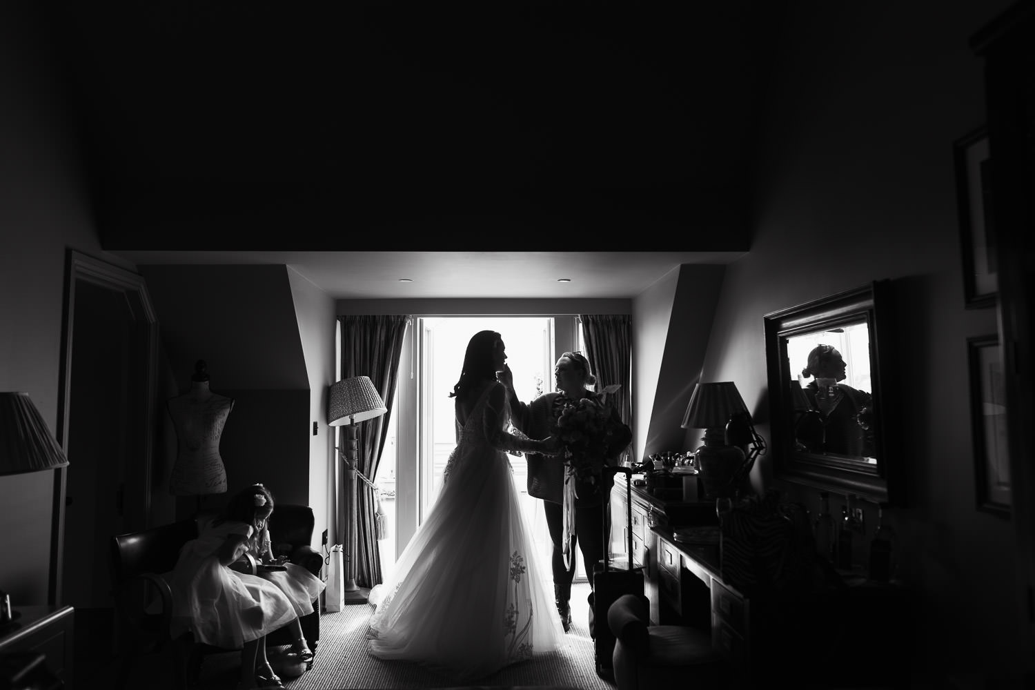 The Lion Inn Wedding: Bride gets ready with Lexi Brownfield makeup artist in the deluxe suite, wearing a Desiree wedding dress 69536 by Ronald Joyce from Serena Bridal shop. An unstaged moment preserved by a documentary wedding photographer.