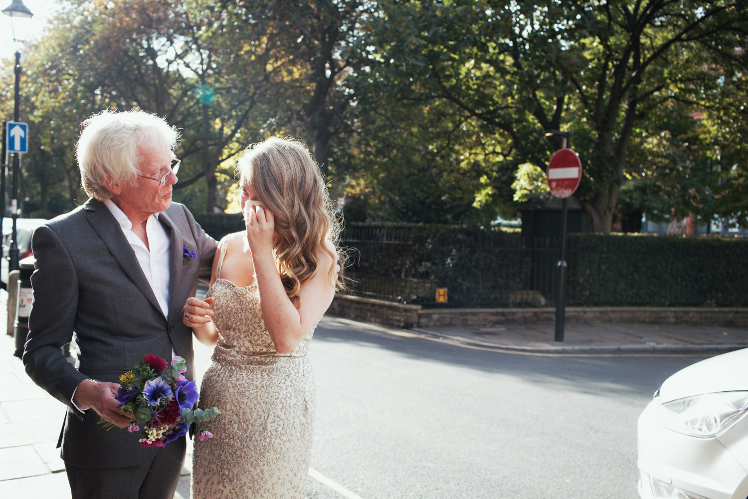 Andy McConnell with his daughter on her wedding day as she arrives at the Union Chapel church in Islington.