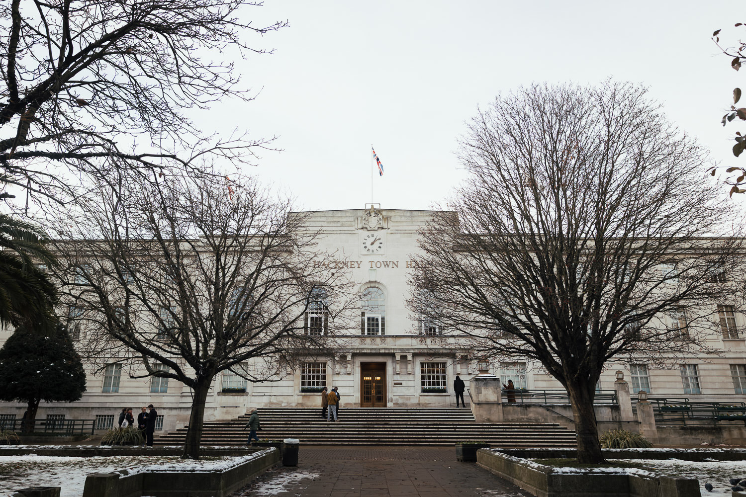 Hackney Town Hall in the winter. Snow on the ground.